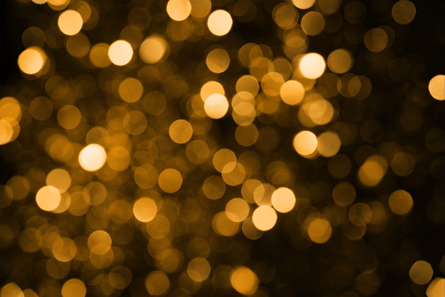 Golden Bokeh Lights Background with Warm Glowing Orbs