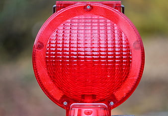 Close-up of red warning light on construction site