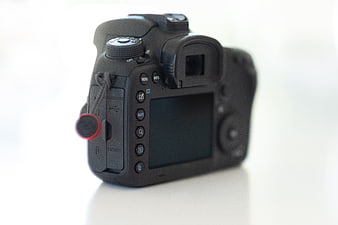Black DSLR Camera Body Isolated on White Background