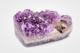 Raw Amethyst Crystal Cluster on White Background