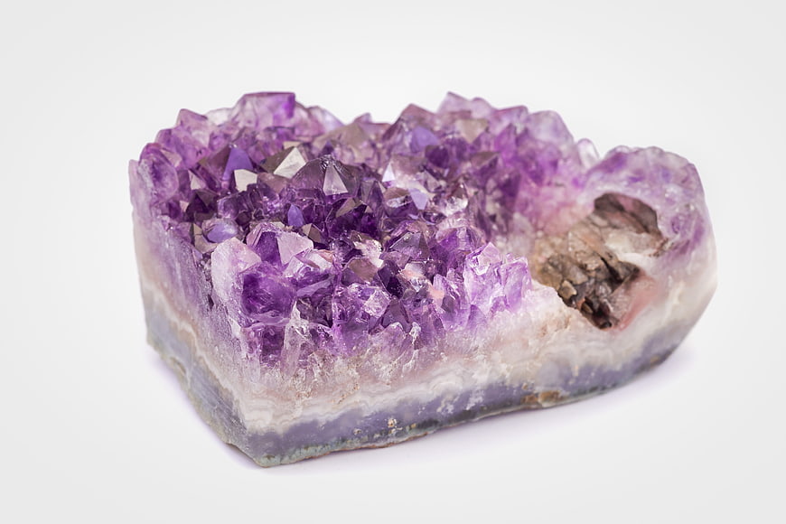 Raw Amethyst Crystal Cluster on White Background
