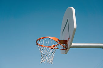 Outdoor Basketball Hoop Against Clear Blue Sky
