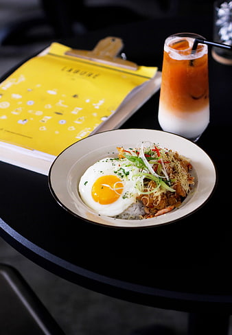 Fried chicken rice bowl with egg and iced coffee