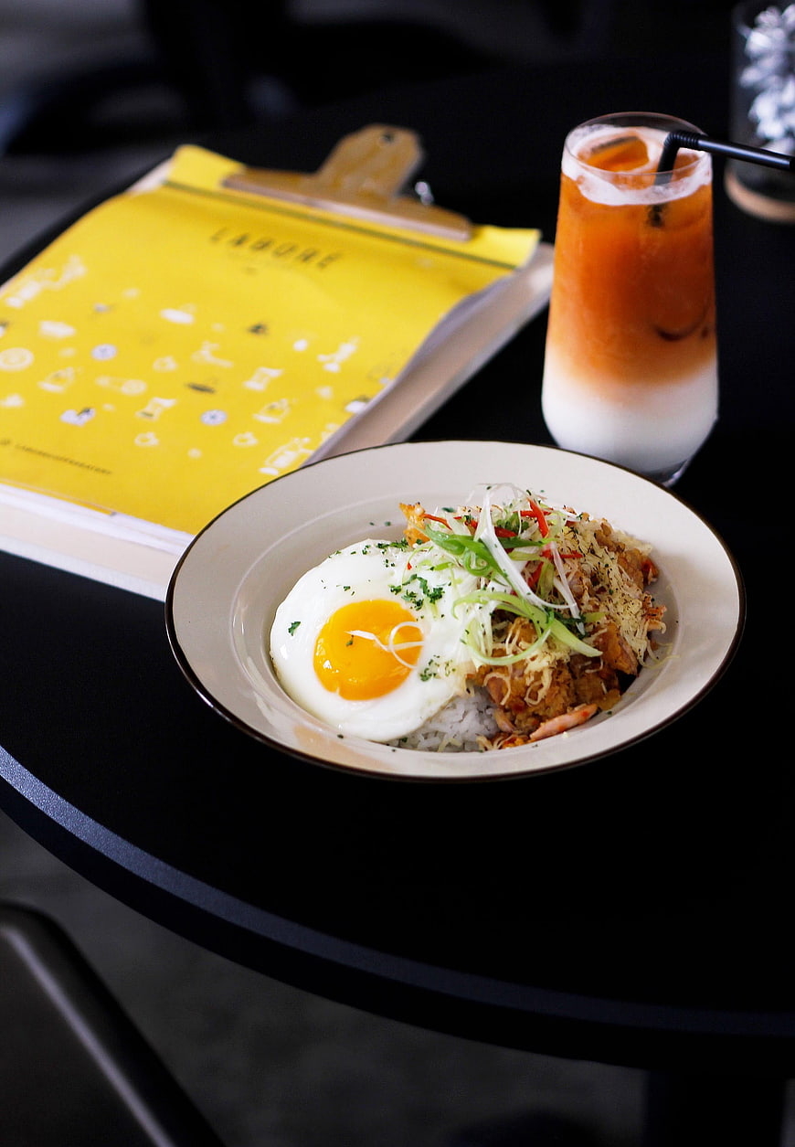 Fried chicken rice bowl with egg and iced coffee