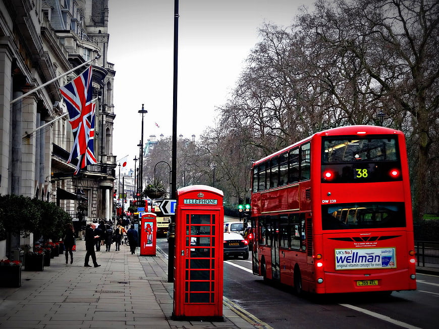 London street scene with red double-decker bus and telephone box