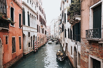 Venice Canal with Gondola and Historic Buildings