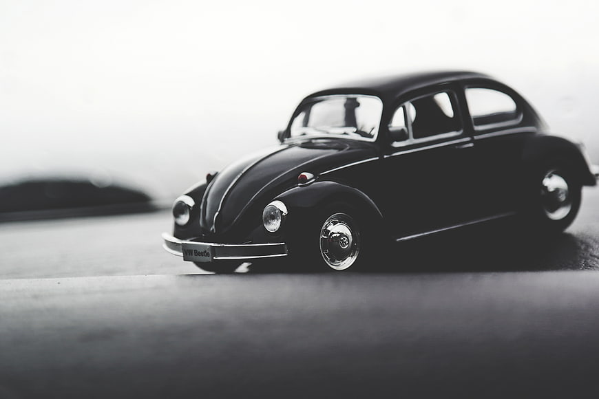 Black and white vintage Volkswagen Beetle model car