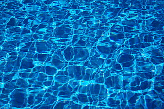 Blue Swimming Pool Water Surface Ripples Background