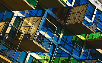 Modern Colorful Glass Architecture with Geometric Balconies