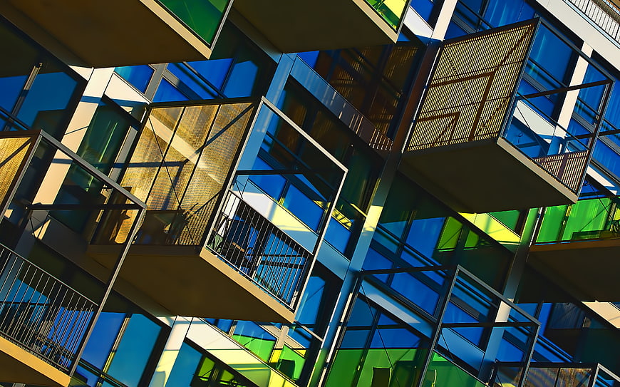 Modern Colorful Glass Architecture with Geometric Balconies