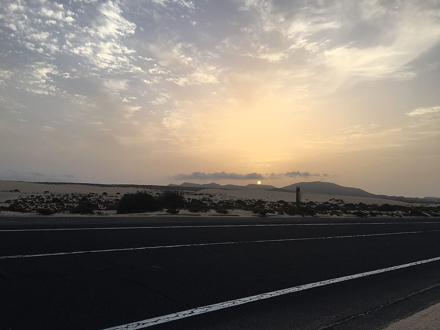Sunset over desert highway in Fuerteventura