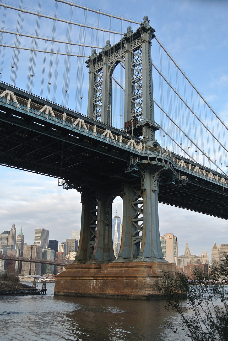 Manhattan Bridge Tower with NYC Skyline and One World Trade Center