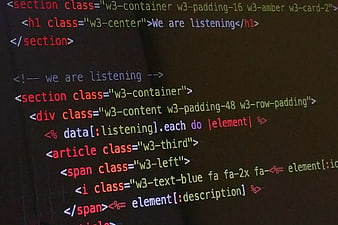 HTML and Ruby Code on Dark Screen
