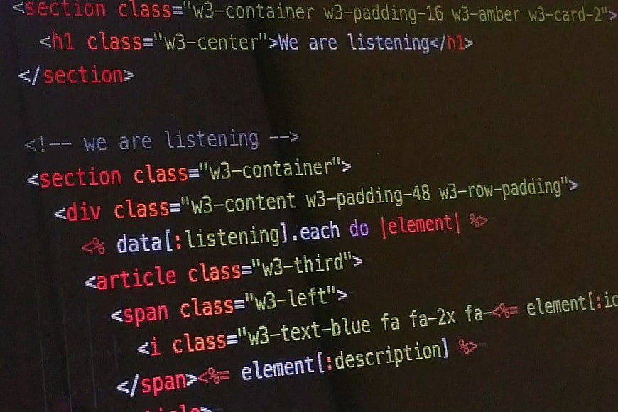 HTML and Ruby Code on Dark Screen