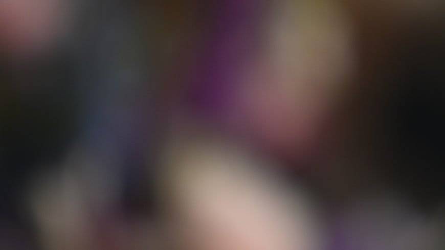 Abstract Blurred Background with Soft Purple and Beige Bokeh