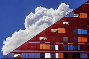 Modern Colorful Building Facade Against Blue Sky