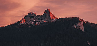 Dramatic Mountain Peak at Sunset with Pink Sky