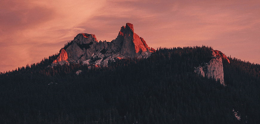 Dramatic Mountain Peak at Sunset with Pink Sky
