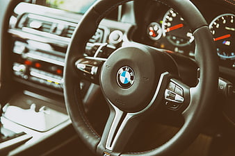 Close-up of BMW M6 steering wheel and dashboard interior
