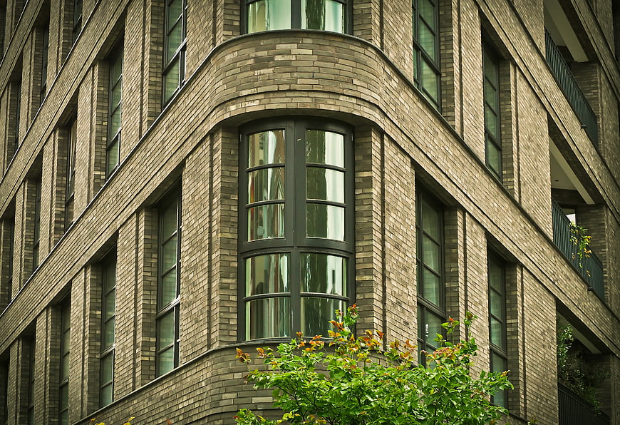 Modern Brick Building Corner with Arched Window