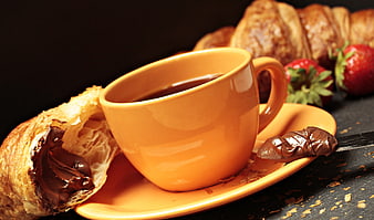 Orange Coffee Cup with Chocolate Croissant and Strawberries