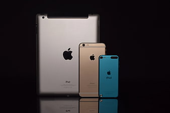 Apple iPad, iPhone 6, and iPod Touch on Black Background