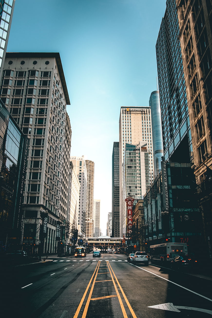 Chicago Street View with Skyscrapers and Chicago Theatre Sign