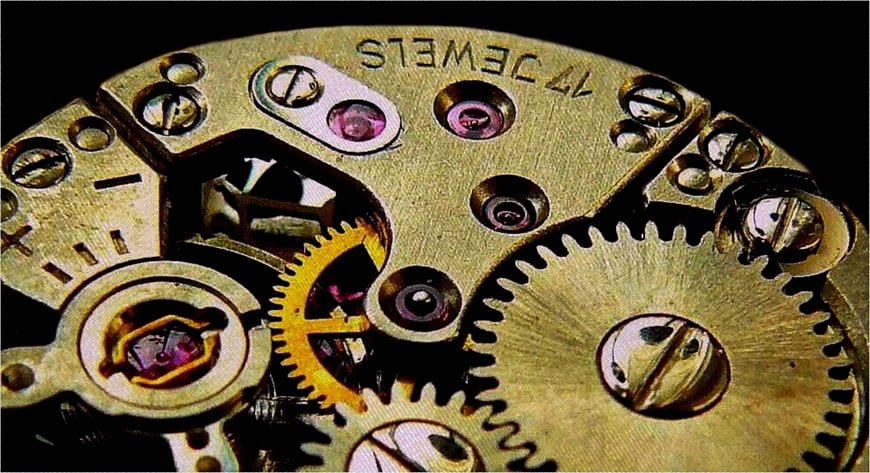 Macro View of Vintage Watch Movement Gears and Jewels