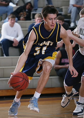 High School Basketball Player Dribbling Ball