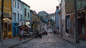 Colorful Cobblestone Street in Historic Neighborhood at Dusk