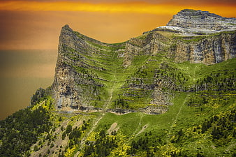Dramatic Pyrenees Mountain Ridge At Golden Hour Sunset