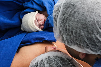 Newborn baby skin-to-skin contact with mother in hospital