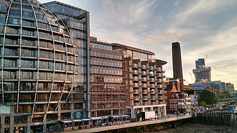 Modern Glass Architecture Along River Thames at Sunset
