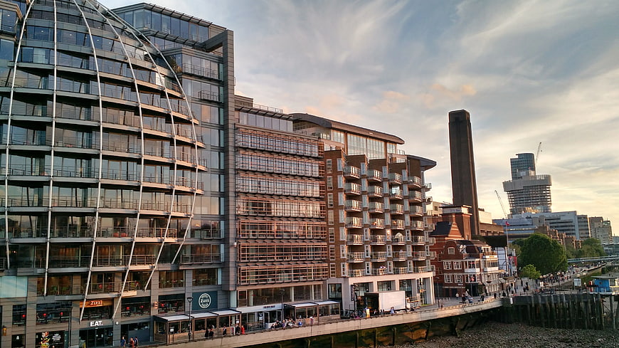 Modern Glass Architecture Along River Thames at Sunset