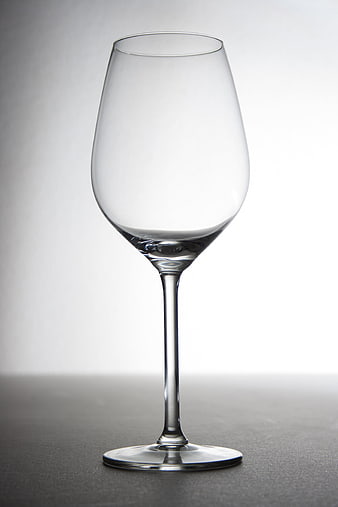 Empty Crystal Wine Glass on Gray Background