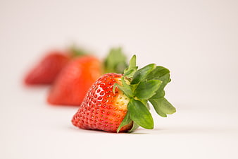 Fresh Ripe Strawberry Close-Up on White Background