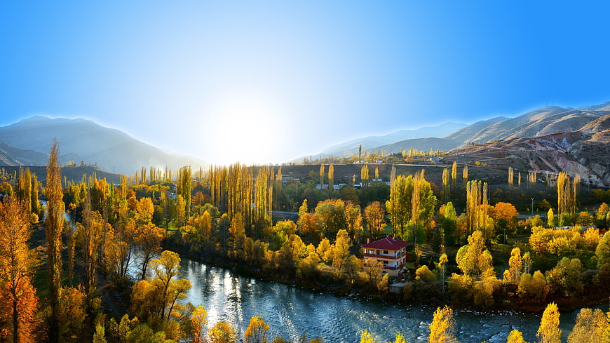 Aerial View of Autumn River Valley with Golden Trees and Mountains