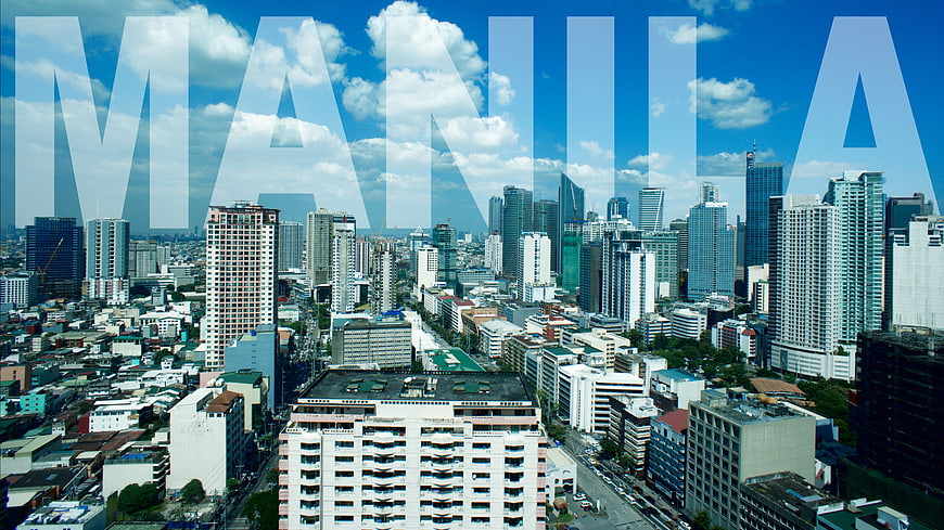 Manila City Skyline with Large Text Overlay