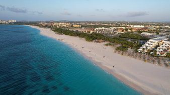 Aerial View of Turquoise Beach and Coastal Resort Town