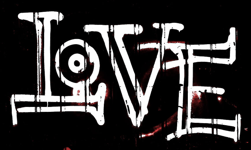 White graffiti love lettering on black background