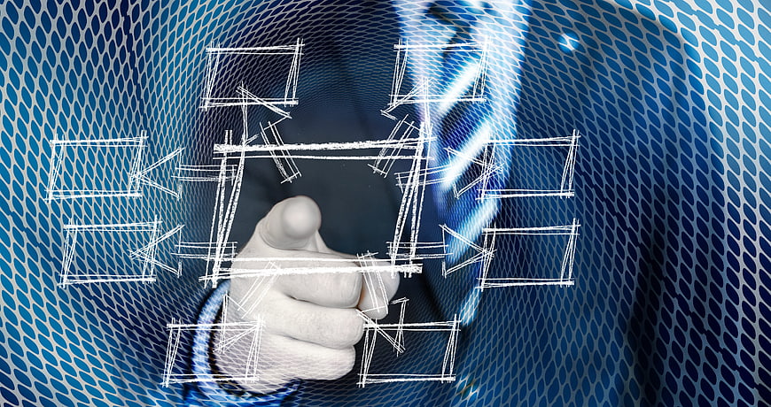 Businessman hand drawing flowchart on glass screen