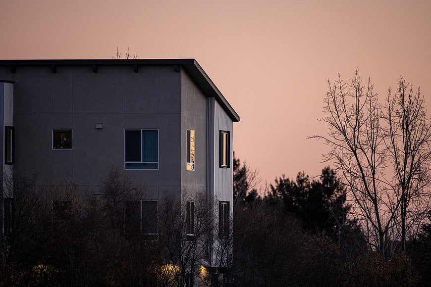 Modern House Silhouette Against Pink Dusk Sky