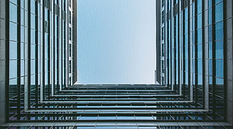 Low angle view of modern glass skyscraper architecture