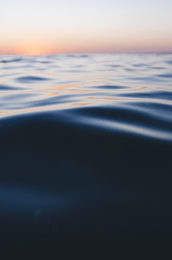 Abstract Ocean Waves at Sunset with Soft Focus