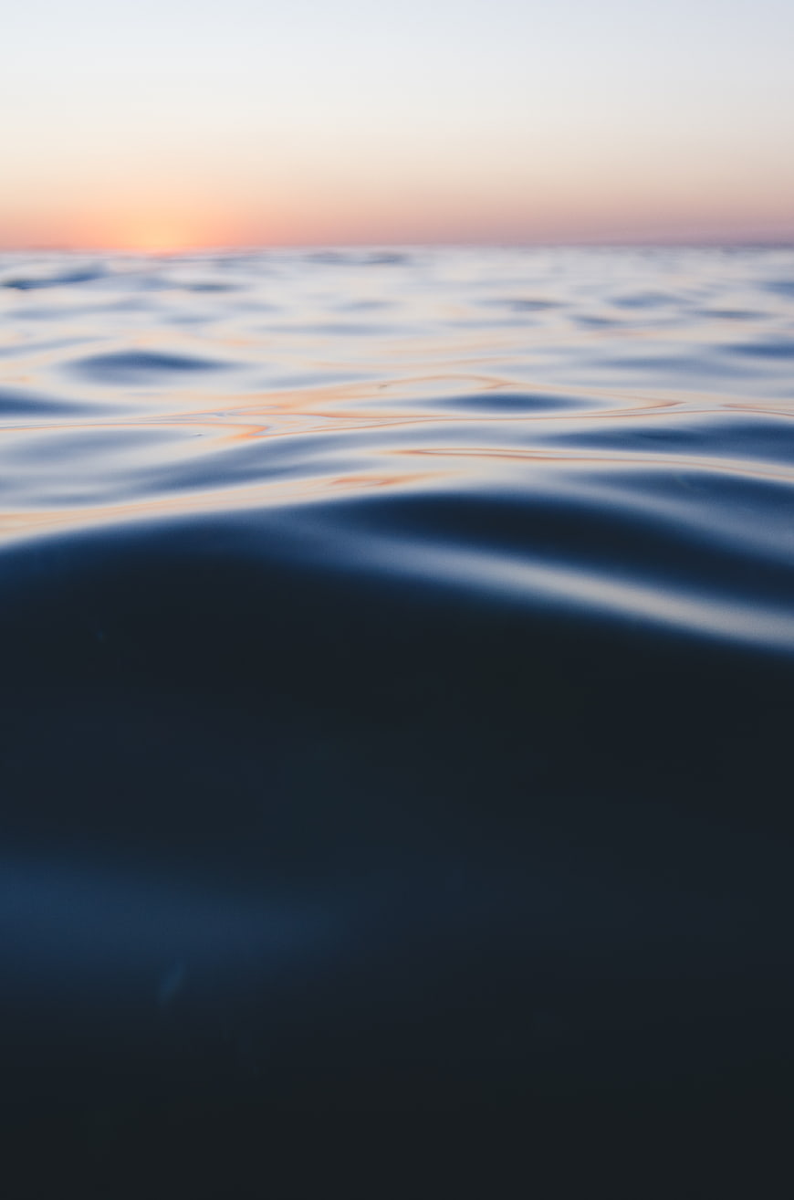 Abstract Ocean Waves at Sunset with Soft Focus