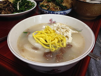 Traditional Korean Tteokguk Rice Cake Soup With Egg And Beef