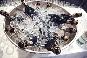 Champagne bottles chilling in ice bucket for celebration
