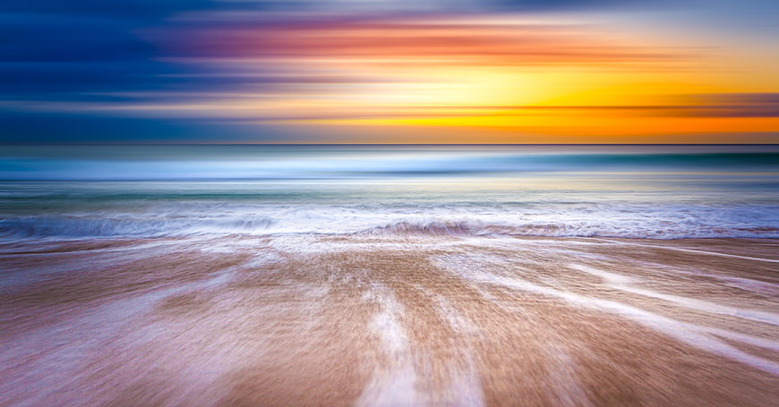 Long Exposure Sunset Beach with Smooth Ocean Waves