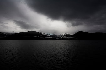 Dramatic Dark Stormy Sky Over Mountain Lake Landscape
