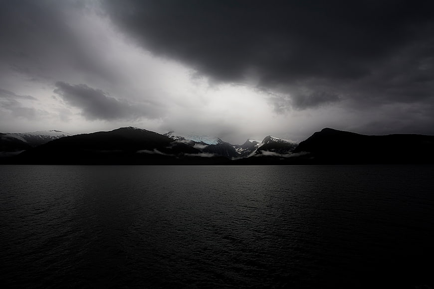 Dramatic Dark Stormy Sky Over Mountain Lake Landscape